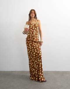 Model wearing Satin bias maxi skirt in deer print