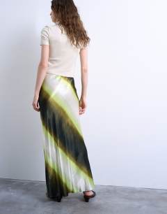 Model wearing Satin bias maxi skirt in lime ombre stripe