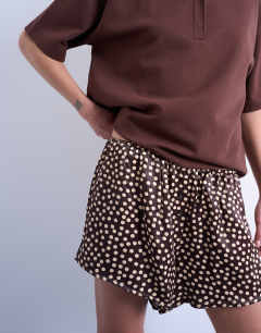 Model wearing Satin boxer short in brown polka dot