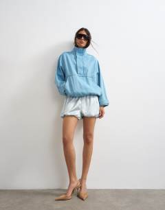 Model wearing Satin bubble short in blue check