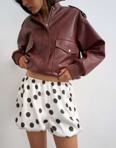 Model wearing Satin bubble short in polka dot