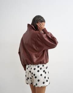 Model wearing Satin bubble short in polka dot