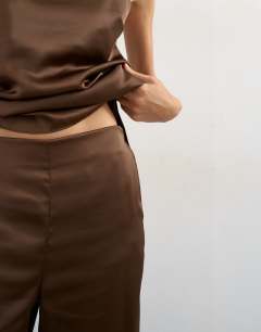 Model wearing Satin clean wide leg trouser co-ord in chocolate