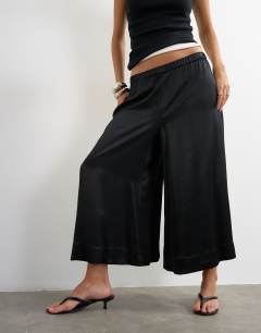 Model wearing Satin culotte in black