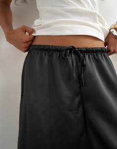 Model wearing Satin culotte in black