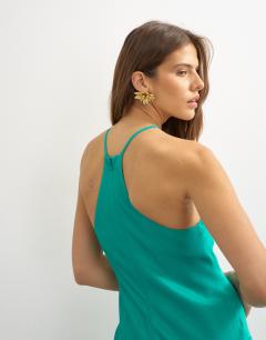 Model wearing Satin cut away racer neck full skirt maxi dress in green