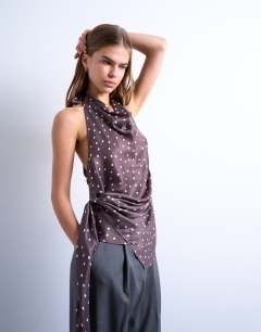 Model wearing Satin draped cowl neck top in polka dot