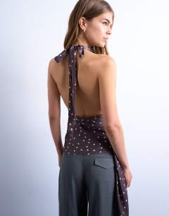 Model wearing Satin draped cowl neck top in polka dot