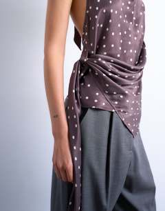 Model wearing Satin draped cowl neck top in polka dot