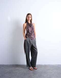 Model wearing Satin draped cowl neck top in polka dot