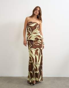 Model wearing Satin dropped waist blouson bandeau maxi dress in brown floral