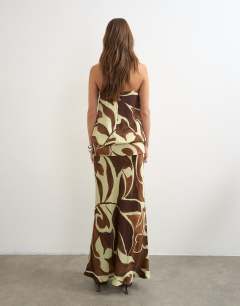 Model wearing Satin dropped waist blouson bandeau maxi dress in brown floral
