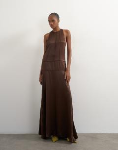 Model wearing Satin dropped waist low armhole maxi dress in chocolate