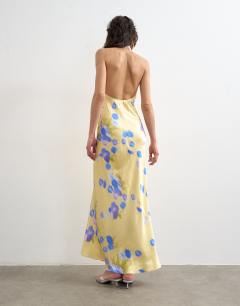Model wearing Satin full neck halter midi dress in buttermilk based blue floral