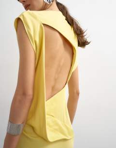 Model wearing Satin grown on neck tuck side maxi dress with open back in yellow