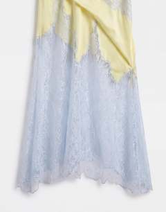 Model wearing Satin halter neck lace hem occasion maxi dress in lime and blue