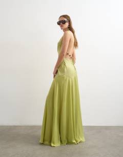Model wearing Satin halter neck maxi dress beaded back detail in lime