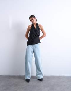 Model wearing Satin halter top in black