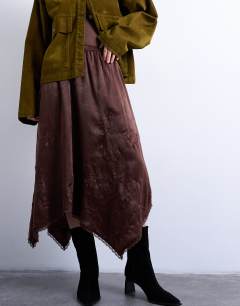 Model wearing Satin hanky hem midi skirt with lace embroidery in chocolate