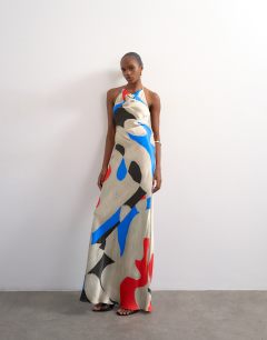 Model wearing Satin high neck cowl maxi dress in bold abstract