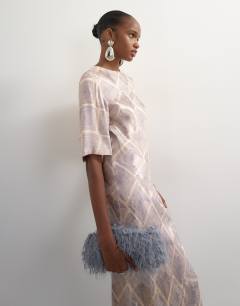 Model wearing Satin jacquard slash neck maxi dress in blue square print