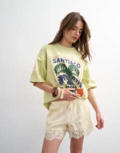 Model wearing Satin lace insert short in ecru