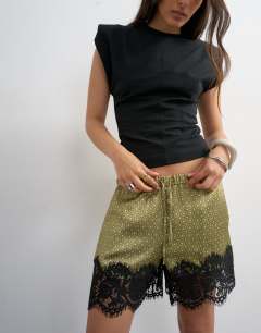 Model wearing Satin lace insert short in geo print