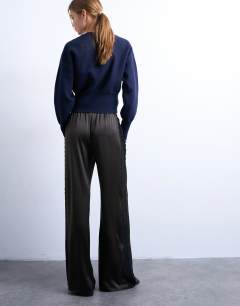 Model wearing Satin lace insert trouser in brown