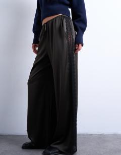 Model wearing Satin lace insert trouser in brown