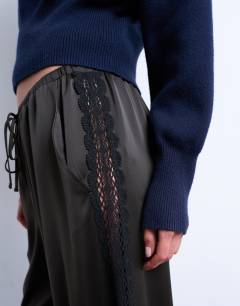 Model wearing Satin lace insert trouser in brown