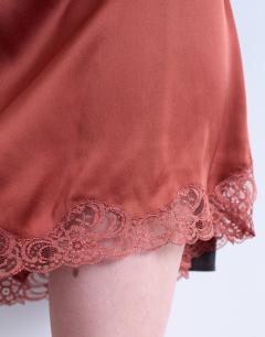 Model wearing Satin lace petticoat mini skirt in chutney