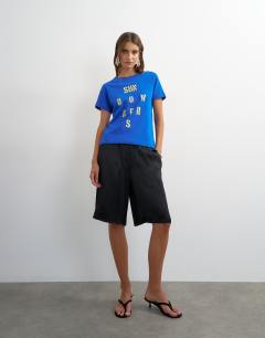 Model wearing Satin longline short in black