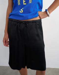 Model wearing Satin longline short in black