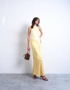 Model wearing Satin maxi occasion halter dress in yellow gradient