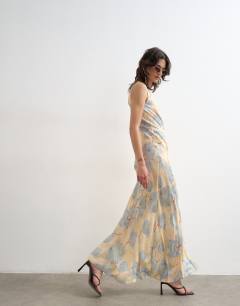 Model wearing Satin racer neck maxi dress in blue floral jacquard