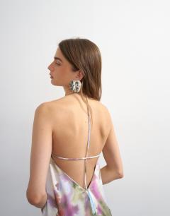 Model wearing Satin seamed maxi dress with piped edges in painterly floral