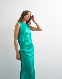 Model wearing Satin sleeveless asymmetric drape maxi dress in emerald green