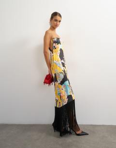 Model wearing Satin strappy square neck maxi dress with fringed hem in black based floral print