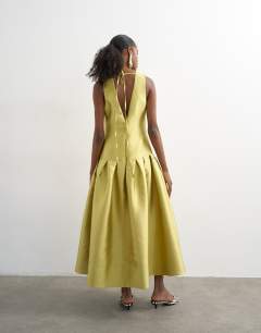 Model wearing Satin structured dropped waist maxi dress in washed lime