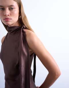 Model wearing Satin tie neck bias sleeveless dress in brown