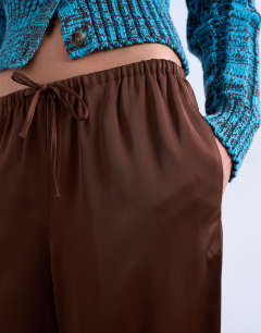 Model wearing Satin tie waist wide leg trouser in chocolate