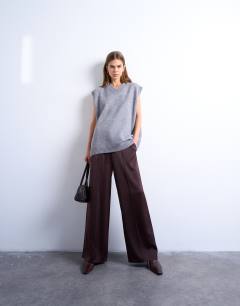 Model wearing Satin tie waist wide leg trouser with pintuck seam detail in burgundy