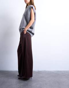 Model wearing Satin tie waist wide leg trouser with pintuck seam detail in burgundy