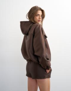 Model wearing Satin twill runner short co ord in brown