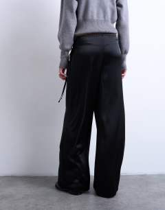 Model wearing Satin wrap around with lace wide leg trouser in black