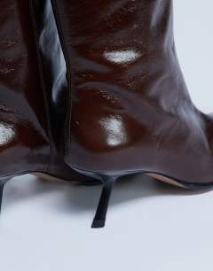Model wearing Scarlett Premium leather square toe knee high boot in chocolate