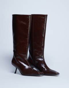 Model wearing Scarlett Premium leather square toe knee high boot in chocolate