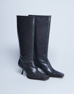 Model wearing Scarlett Premium leather square toe knee high boot in grey