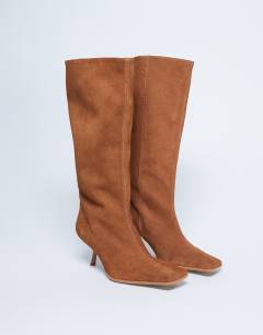Model wearing Scarlett Premium leather square toe knee high boot in tan
