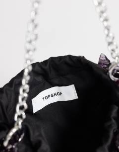 Model wearing Scarlett small beaded shoulder bag in black